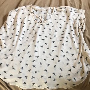 Maurice’s Sheer bird shirt with cross cross design